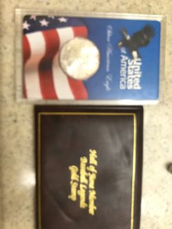 Silver eagle and gold hall of fame card