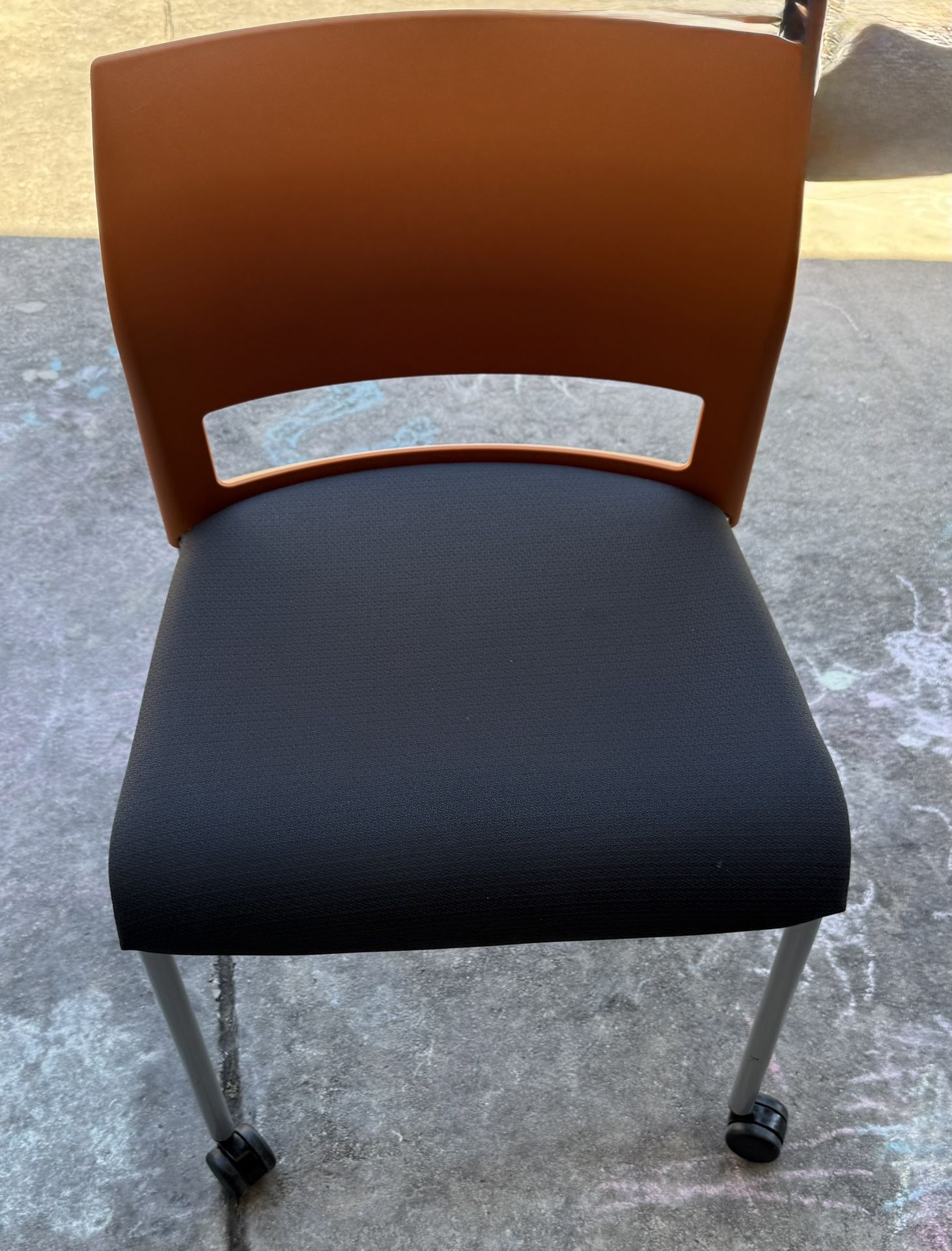 Orange Plastic Chair w/wheels