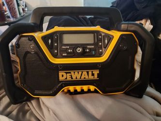 This is a DEWALT 12V/20V MAX Portable Bluetooth Radio (Model DCR028B) w/battery designed for jobsites.