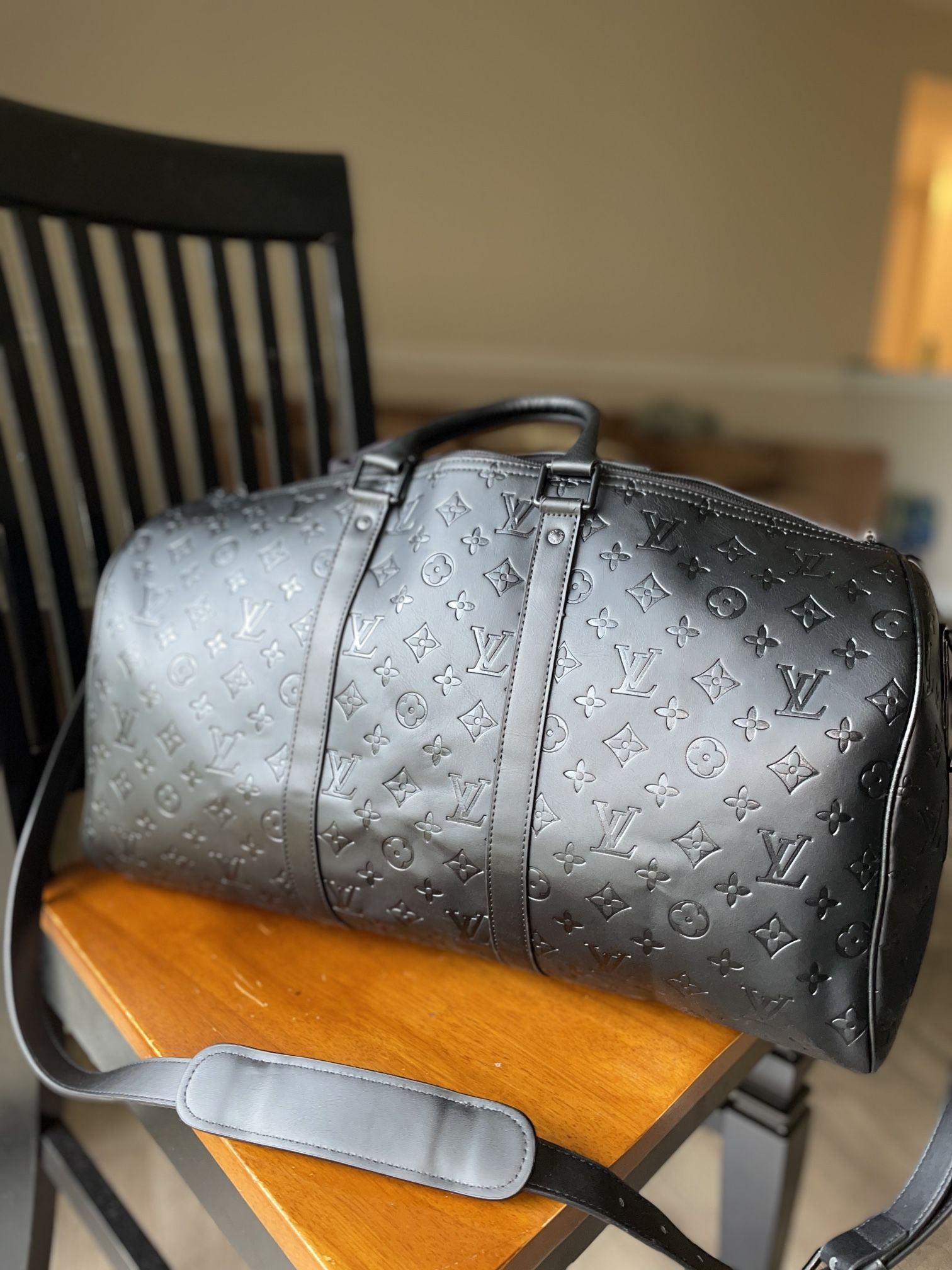 LV Keepall Bandoulière 50
