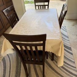 Solid Wood Dining Table + 4 Chairs + 5x7.5 Rug – Great Condition – Moving Sale