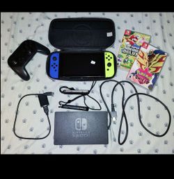 Nintendo Switch bundle w/ games, 64gb sd card and pro controller