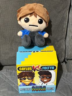 Caylus vs Foltyn 6” Mystery Aura Plush Toy - CAYLUS