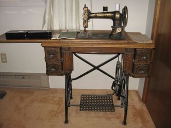 Antique whites sewing machine