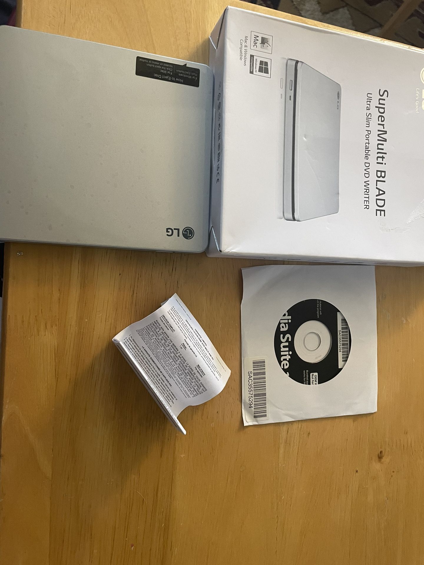 Lg Super Multi Blade Ultra Slim, Portable Dvd Writer Still In Box And Has Plastic Protection On. It Will Take Best Offer.
