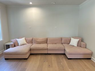 Beautiful pink sectional from Bella Home Furnishing