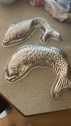 Vibtage metal Fish molds.