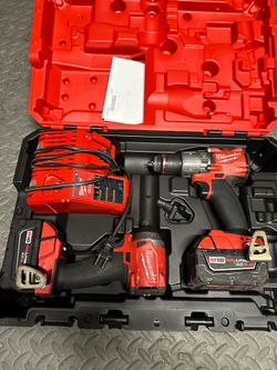 Milwaukee m18 fuel 1/4 impact and hammer drill with 2x5.0 batteries and charger like new