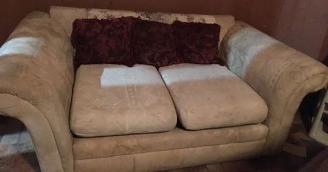 Tan Couch/Love Seat with 3 Pillows