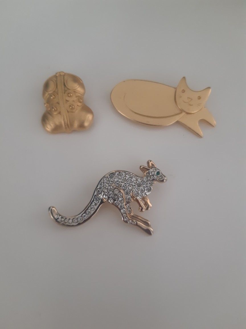 NEVER USED, BROOCH, $5 EA.