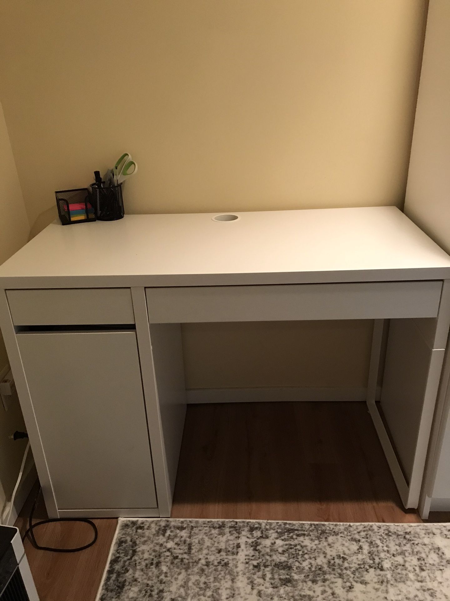 White IKEA desk and rolling chair