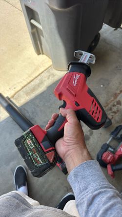 New Milwaukee M18 Hacksaw with used battery