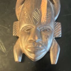 hand-carved wooden African tribal mask,