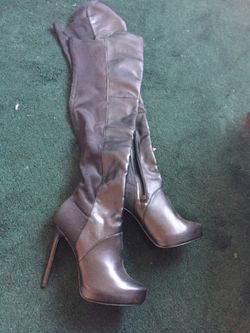 Black thigh high boots