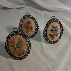 vintage frames on stand