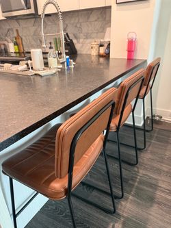 BROWN LEATHER BARSTOOLS