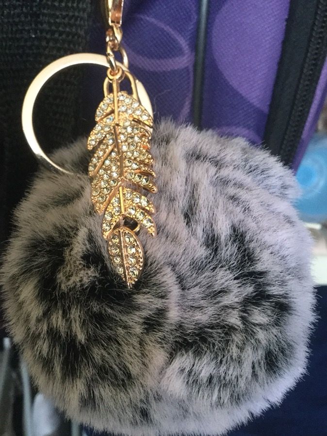 Keychain fur ball with feather ornament $12 / Purple Foxy keychain 🦊 $12 / Leather wallet keychain $20