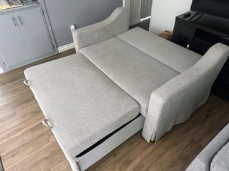 Sofa bed, like new—excellent quality, durable fabric.