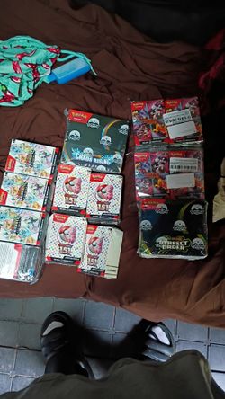 Unopened boxes of pokemon mega evolution and scarlet&violet
