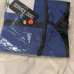 blue service dog harness vest, similar to models manufactured by brands like Top Dogs.