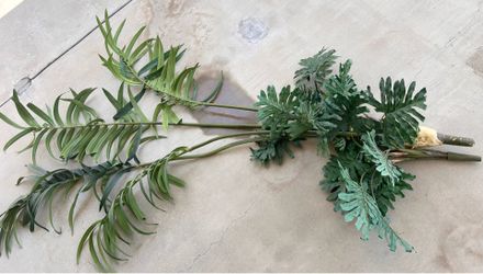 Unassembled artificial faux plant.