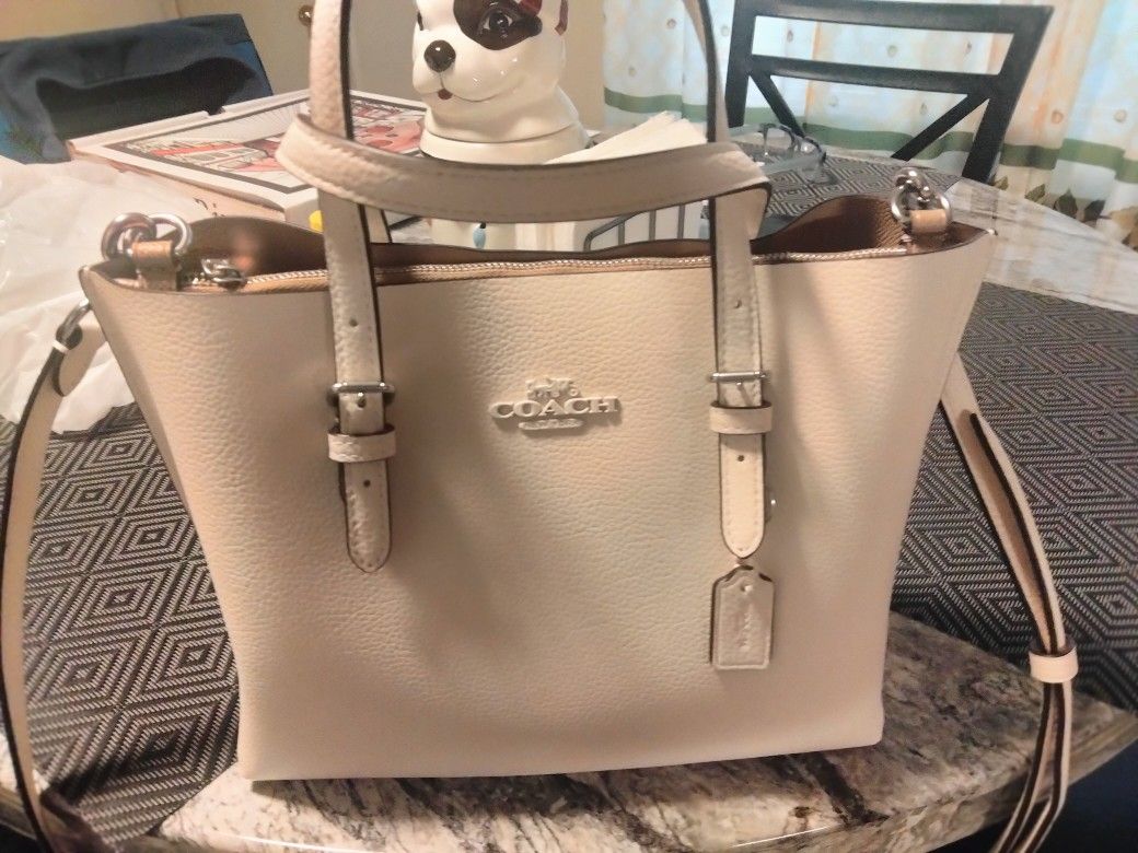 Carterra Marca Coach