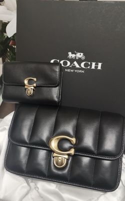 Authentic coach purse and matching wallet.