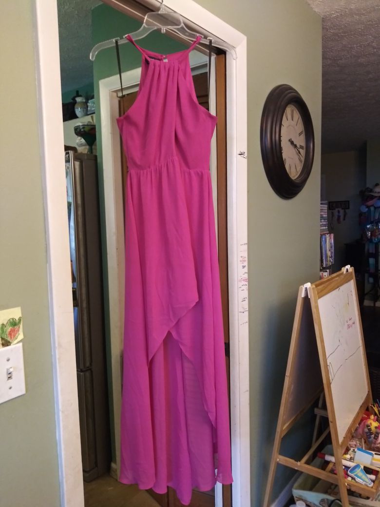 Size 2 Bebe pink dress with tags intact.
