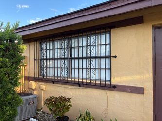 2 Windows Iron Bars W 111” H 55”excellent condition
