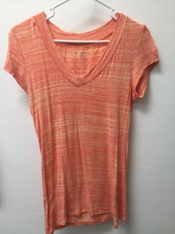 Size small Heathered orange v neck shirt