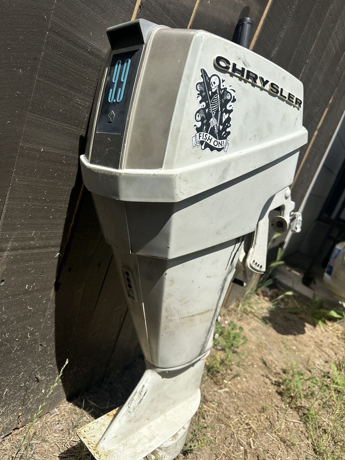 9.9hp chrysler outboard motor