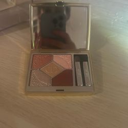 Dior Diorshow 5 Couleurs Couture Eyeshadow Palette, specifically a limited-edition version with a golden case and engraved powders.  