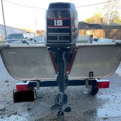 14 Ft Boat With 15 HP Mercury 