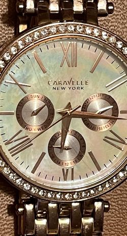 Caravelle New York 44N101 Women's Round Analog Mother of Pearl Day Date Watch