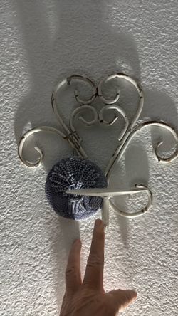 Rustic candle holder extra is the  purple flower