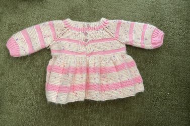 Knitted baby girl clothes