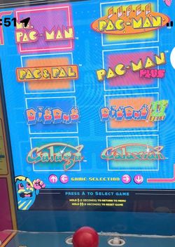 Over the door hanging PAC Man game