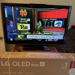 Panasonic TC-P54VT25 Plasma TV, Panasonic DMP-BDT100 3D Blueray player AND Solid wood TV Stand