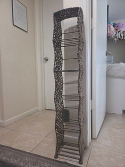 Wicker shelve. Can be used as cd,dvd or book shelve