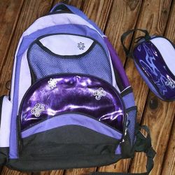 Girls purple backpack with matching pencil case... heavy duty bag... good to carry heavy books!