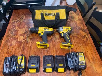 Dewalt (1) Dewalt bag (1) drill (1) impact (3) batteries (2) chargers