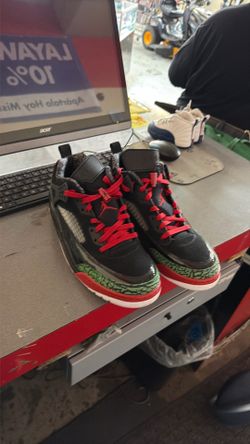 Black red and green jordan size 12