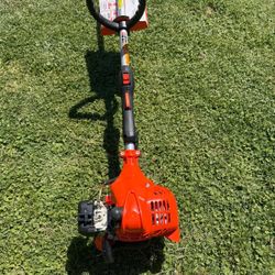 ECHO
21.2 cc Gas 2-Stroke Curved Shaft String Trimmer with Rapid-Loader Trimmer Head