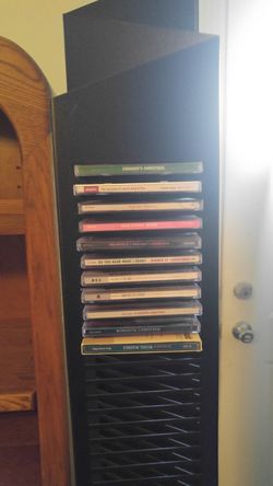 6 ft tall black metal cd towers x2. Geometric shaped . can free stand or be mounted on wall. Local puckup only.