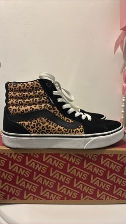 Vans Ward Hi high-top sneakers in the "Leopard" (Black/Leopard) colorway.