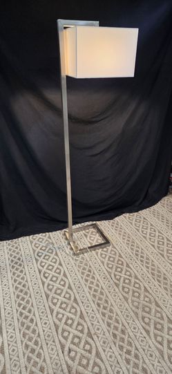 Brushed metal floor lamp