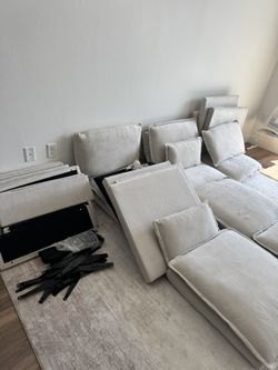 Selling new cushions and parts for a modular/sectional sofa.