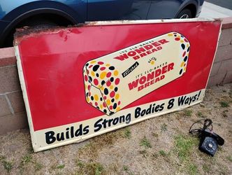Wonder Bread Sign 73x37 Vintage 1950's embossed sign.
An extremely rare version of this iconic sign due it's massive size.
The 60" version is the bigg