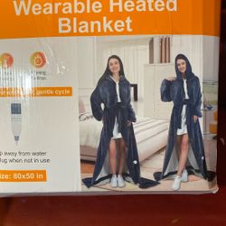 Wearable heated blanket