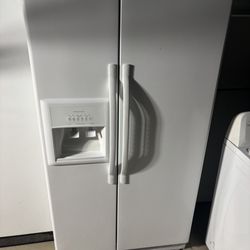 Very clean white side-by-side refrigerator will deliver and install